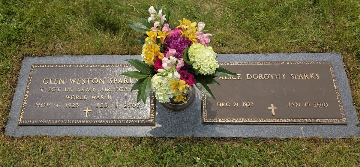 After — Bronze plaques cleaned and floral placement